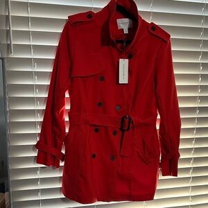 Carolina Belle Bold Red Trench Coat with plastic and metal hardware